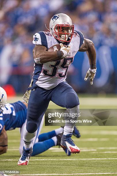 New England Patriots running back Jonas Gray breaks free for a big gain during a football game between the Indianapolis Colts and New England...