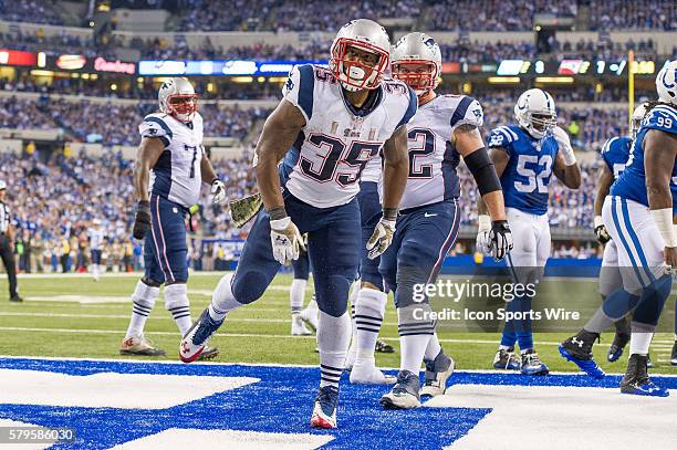 New England Patriots running back Jonas Gray spikes the ball after a touchdown during a football game between the Indianapolis Colts and New England...