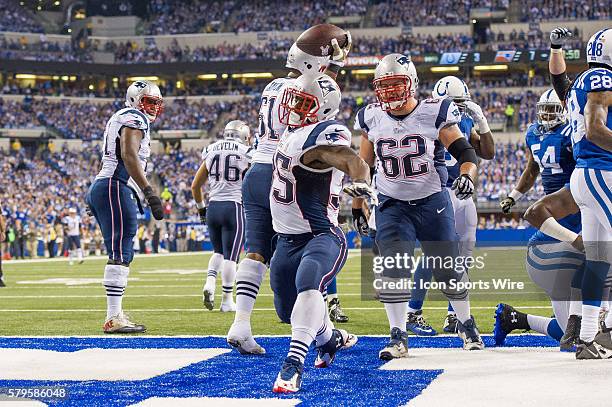 New England Patriots running back Jonas Gray spikes the ball after a touchdown during a football game between the Indianapolis Colts and New England...