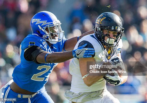 California Golden Bears tight end Raymond Hudson catches a pass for a first down as Air Force Falcons defensive back Tyler Weaver defends during the...