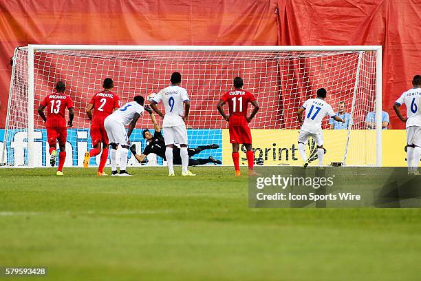 Andy Najar of Honduras scores on the rebound after Jaime Penado of Panama saves the penalty during a group stage game of the CONCACAF Gold Cup...