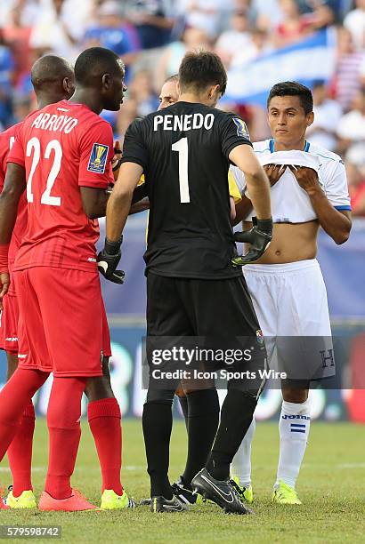 Panama goalkeeper Jaime Penedo tries to freeze out Honduras midfielder Andy Najar prior to the penalty kick. The Men's National Team of Honduras and...