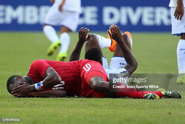 Panama forward Luis Tejada grabs his face after being kicked. The Men's National Team of Honduras and the Men's National Team of Panama drew 1-1 in a...