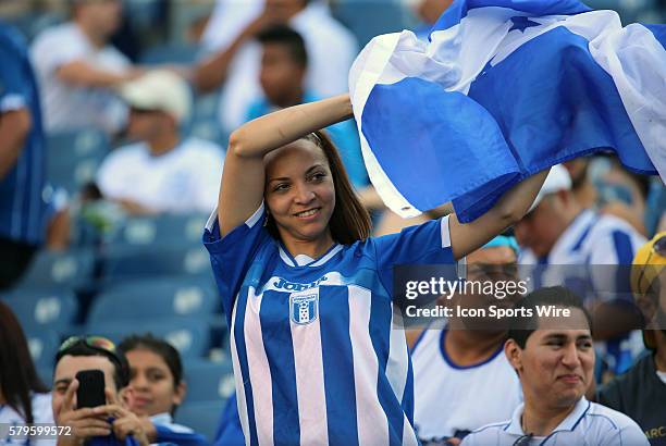 Waving the flag of Honduras. The Men's National Team of Honduras and the Men's National Team of Panama drew 1-1 in a CONCACAF Gold Cup group stage...