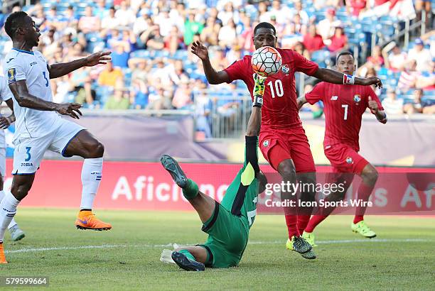 Honduras goalkeeper Donis Escober tries to punch the ball away but Panama forward Luis Tejada has it for the game's first goal. The Men's National...