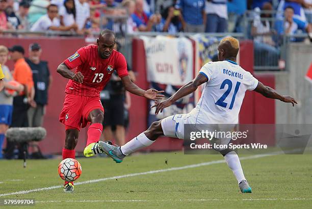 Panama defender Adolfo Machado gets the pass away before Honduras defender Brayan Beckeles can prevent it. The Men's National Team of Honduras and...