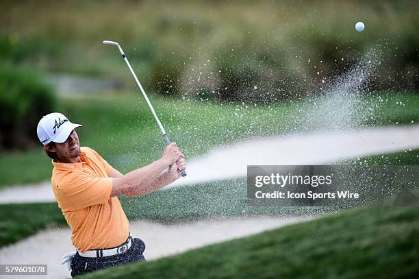 Houston, TX-- Aaron Baddeley blast out of a trap during second round play of the Shell Houston Open at the Golf Club of Houston, Humble, TX.