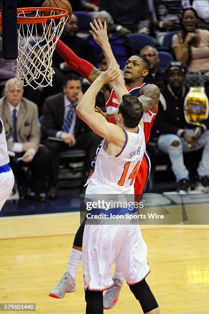 Washington Wizards guard Bradley Beal in action against New York Knicks forward Jason Smith at the Verizon Center in Washington, D.C. Where the...