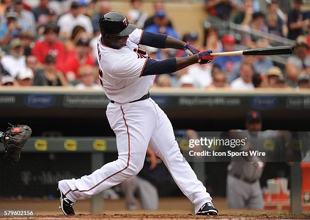 Minnesota Twins designated hitter Miguel Sano hits a two-run home run against the Detroit Tigers in the first inning of their Major League Baseball...