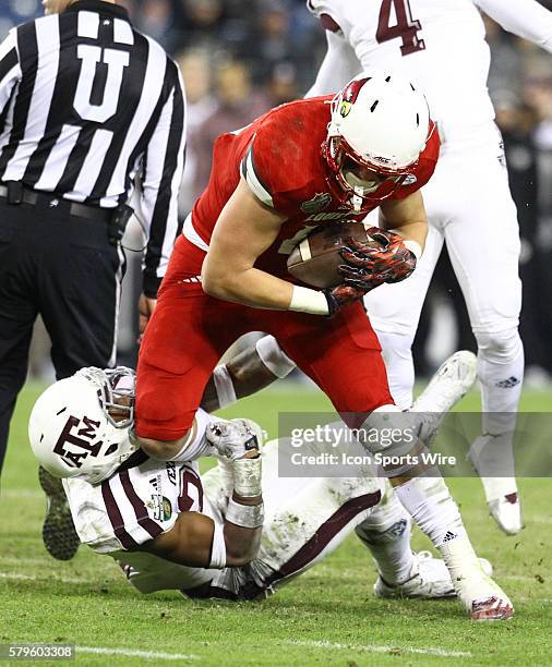 Louisville Cardinals tight end Cole Hikutini in second half action the Franklin American Mortgage Music City Bowl match-up between Texas A&M and...