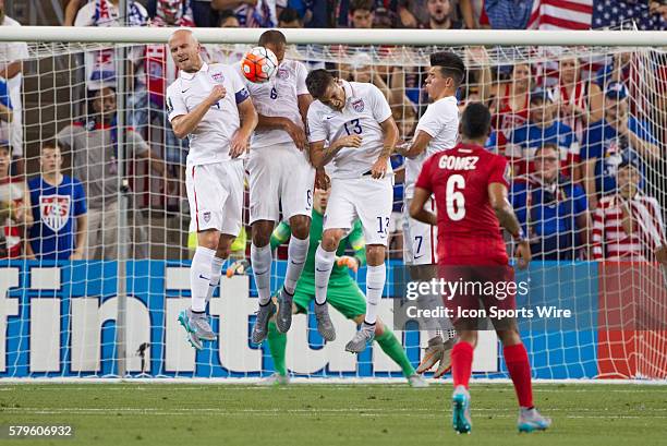 Team USA blocking a penalty kick during the CONCACAF Gold Cup Group Stage match between Panama and the USA at Sporting Park in Kansas City, Kansas....