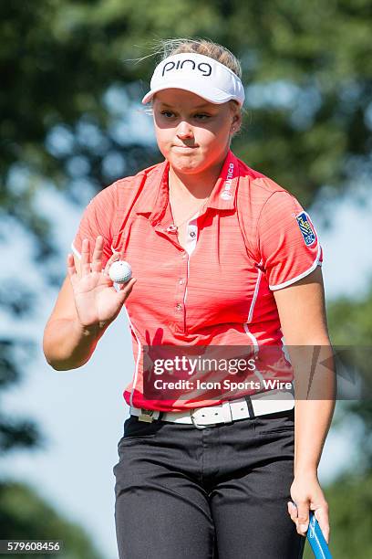 Brooke Henderson acknowledges the gallery around the green during the second round of the 2015 U.S. Women's Open at Lancaster Country Club in...