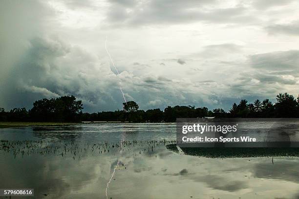 Lightning and heavy rains force the USGA to suspend play during the first round of the 2015 U.S. Women's Open at Lancaster Country Club in Lancaster,...