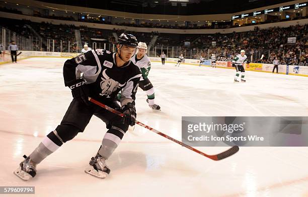 San Antonio Rampage player Duncan Siemens chases down a loose puck during 5 - 4 win over the Texas Stars at the Cedar Park Center in Cedar Park, TX.