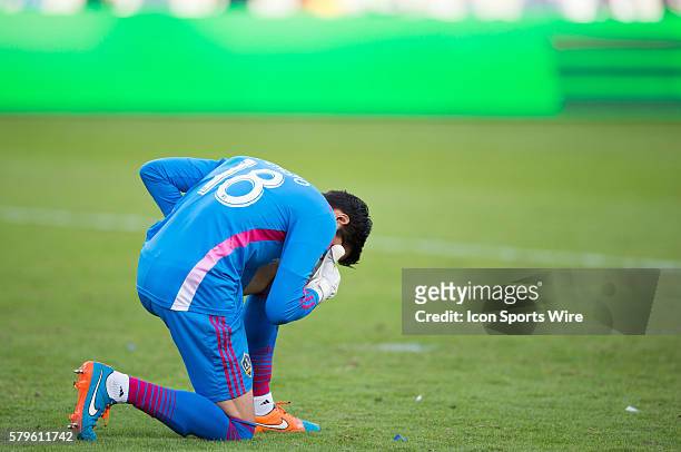 November 23, 2014 - Los Angeles Galaxy goalkeeper Jaime Penedo prays after defeating Seattle Sounders 1-0 after the Western Conference Finals game...