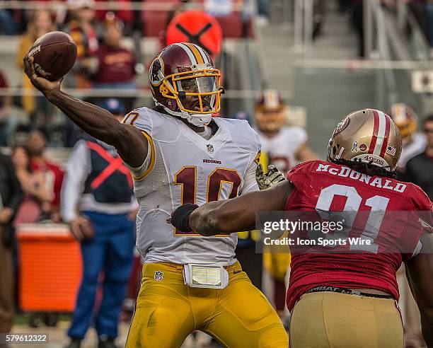 November 23, 2014 San Francisco 49ers defensive end Ray McDonald rushes Washington Redskins quarterback Robert Griffin III on Sunday, November 23 at...