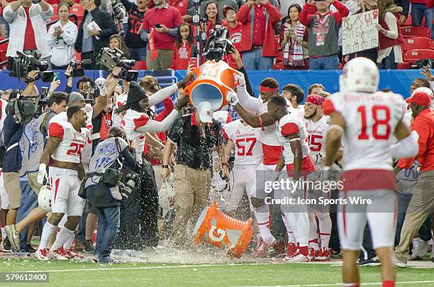 Houston Cougars head coach Tom Herman gets the Gatorade bath after a hard faught vicotry over the Florida State Seminoles in the 2015 Chick-Fil-A...