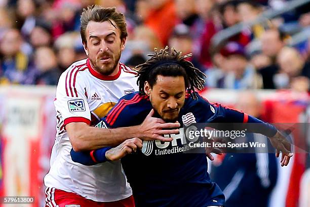 New England Revolution midfielder Jermaine Jones battles New York Red Bulls midfielder Eric Alexander during the first half of the MLS Eastern...