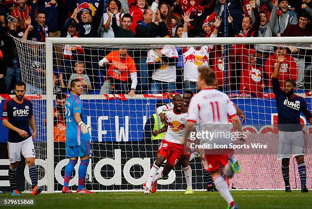 New York Red Bulls' Bradley Wright-Phillips reacts to his goal with New York Red Bulls' Lloyd Sam . The New England Revolution defeated the New York...