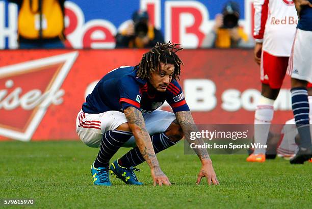 New England Revolution's Jermaine Jones takes a moment to recover after a foul. The New England Revolution defeated the New York Red Bulls 2-1 in the...