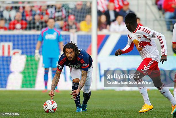 New England Revolution's Jermaine Jones plays the ball quickly after a foul. The New England Revolution defeated the New York Red Bulls 2-1 in the...