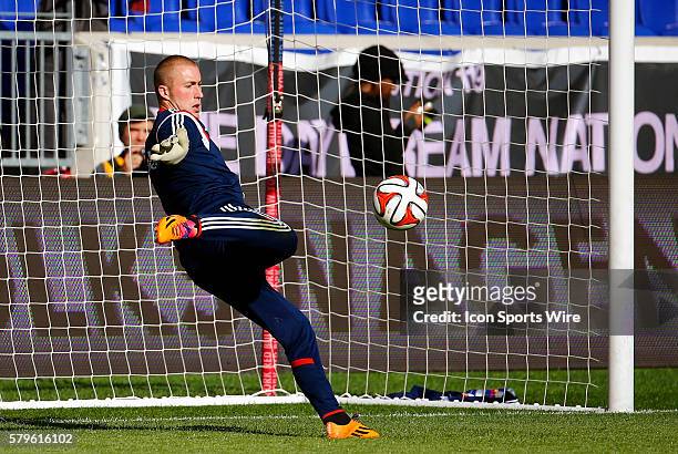 New England Revolution's Brad Knighton camel kicks the ball. The New England Revolution defeated the New York Red Bulls 2-1 in the first leg of the...