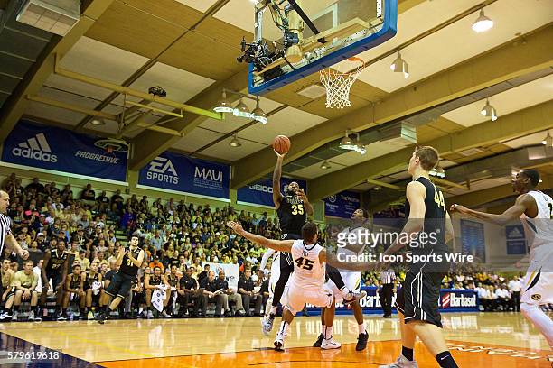 Purdue guard Rapheal Davis drives the lane during the first round of the Maui Invitational at Lahaina Civic Center on Maui, HI.