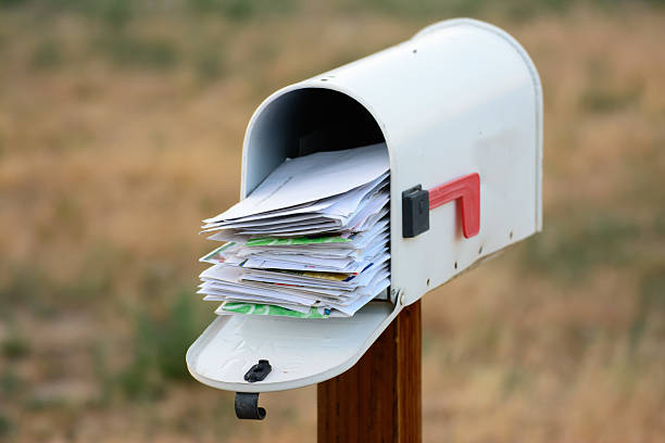 overflowing mailbox - mail stock pictures, royalty-free photos & images