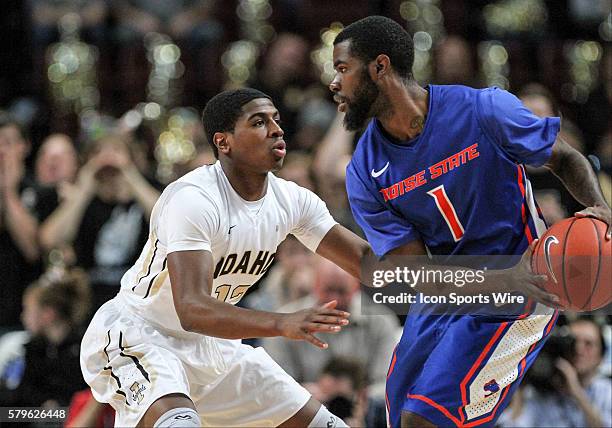 Idaho Vandals guard Mike Scott playing defense against Boise State Broncos guard Mikey Thompson during 1st half action between the Boise State...