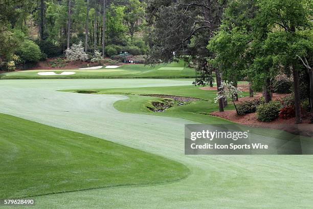 View from the 13th hole's fairway looking back towards the 11th green of Amen's Corner during the practice round for the 2015 Masters Tournament at...