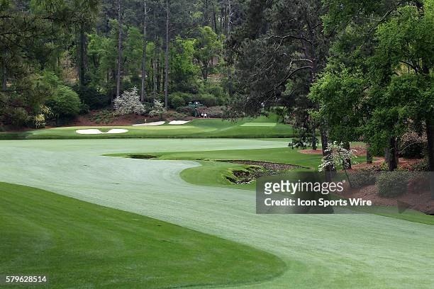 View from the 13th hole's fairway looking back towards the 11th green of Amen's Corner during the practice round for the 2015 Masters Tournament at...