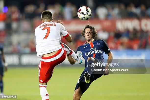 Benfica midfielder Andreas Samaris battles for the ball during the Guinness Cup game between SL Benfica and Paris Saint-Germain F.C. At BMO Field in...