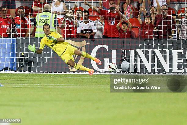 Benfica goalkeeper Julio Cesar watches the penalty kick shot go the other way to score during the Guinness Cup game between SL Benfica and Paris...
