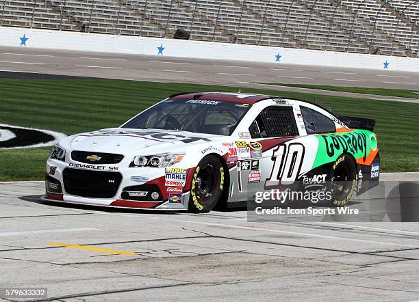 Danica Patrick, driver of the TaxACT/GoDaddy Chevy during practice for the NASCAR Sprint Cup Series Duck Commander 500 at Texas Motor Speedway in Ft....