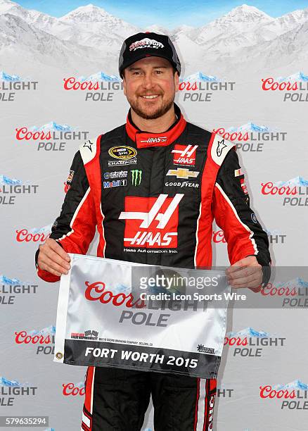 Kurt Busch, driver of the Haas Automation Chevy, celebrates winning the pole for the NASCAR Sprint Cup Series Duck Commander 500 at Texas Motor...