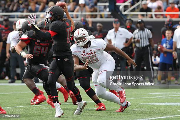 Team Heighlight defensive tackle Rashan Gary puts pressure on Team Armour quarterback Matt Fink during the 2016 Under Armour All-America Game at the...