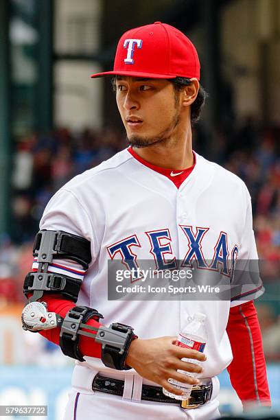 During the home opener between the Houston Astros and the Texas Rangers, Rangers Pitcher Yu Darvish wears an arm brace after under going Tommy John...