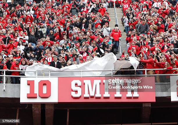 Former Buckeye quarterback and Heisman Trophy winner Troy Smith's name and number are unveiled in Ohio Stadium after his jersey number is retired...