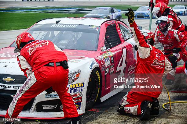 Apr 11, 2015- Ft. Worth, TX-- Kevin Harvick driving the Budweiser/Jimmy John's Chevrolet for Stewart-Haas Racing is cleared to depart the pits at the...