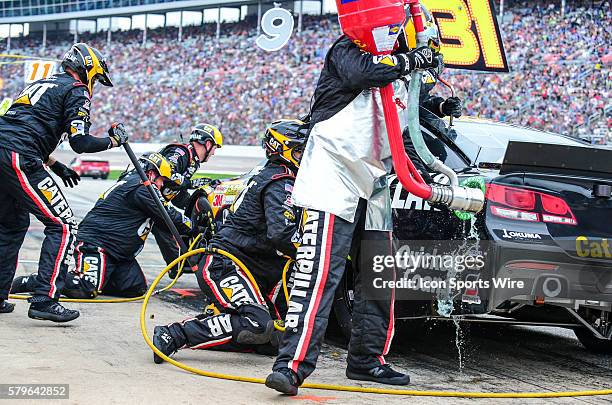 Apr 11, 2015- Ft. Worth, TX-- Ryan Newman , driving the Caterpillar Chevrolet for Richard Childress Racing receives fuel and tires at the Duck...