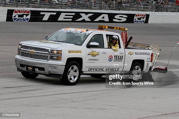 The safety crew in turn 4 during the running of the NASCAR Sprint Cup Series Duck Commander 500 at Texas Motor Speedway in Ft. Worth, TX.