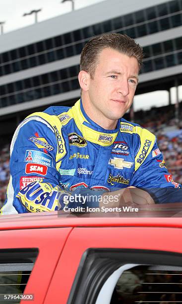 Allmendinger, driver of the Bush's beans Chevy, during pre-race ceremonies before the running of the NASCAR Sprint Cup Series Duck Commander 500 at...
