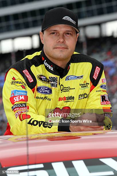 David Gilliland, driver of the Love's Travel Stops Fordl, during pre-race ceremonies before the running of the NASCAR Sprint Cup Series Duck...
