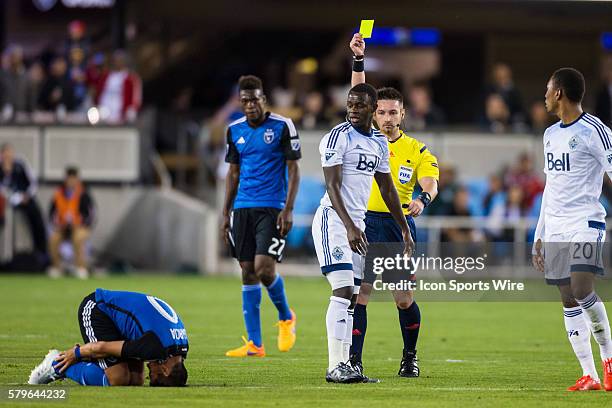 Vancouver FC forward Kekuta Manneh is shown a yellow card after fouling San Jose Earthquakes midfielder Matias Perez Garcia in the 28th minute,...