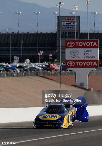Ron Capps DSR Dodge Charger NHRA Funny Car deploys his drag racing parachute during the 16th Annual SummitRacing.com NHRA Nationals at The Strip at...