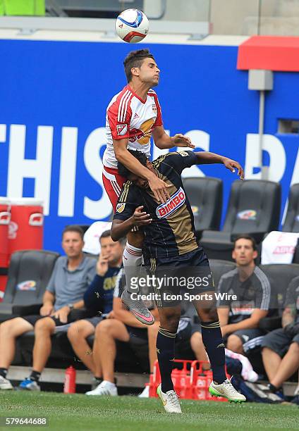 New York Red Bulls defender Matt Miazga leaps up for a header over Philadelphia Union defender Sheanon Williams during a US Open Cup quarterfinal...
