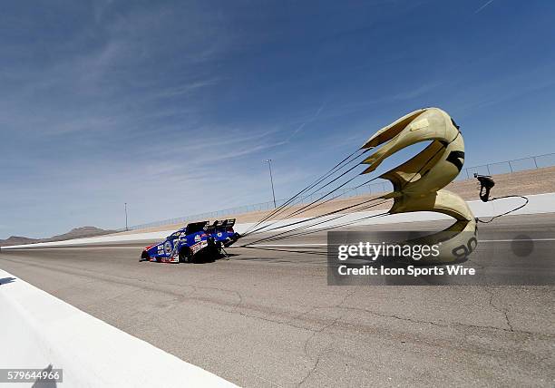 Robert Hight John Force Racing Chevrolet Camaro NHRA Funny Car deploys his drag racing parachute during the 16th Annual SummitRacing.com NHRA...
