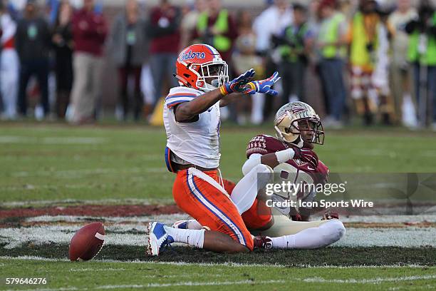 Florida Gators defensive back Vernon Hargreaves III signals no catch after breaking up a pass intended for Florida State Seminoles wide receiver...