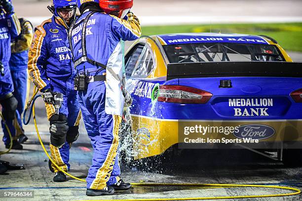 Apr 11, 2015- Ft. Worth, TX-- Sam Hornish Jr. Driving the Medallion Bank/Lyon Financial Ford for Richard Petty Motorsports takes a splash of gas at...