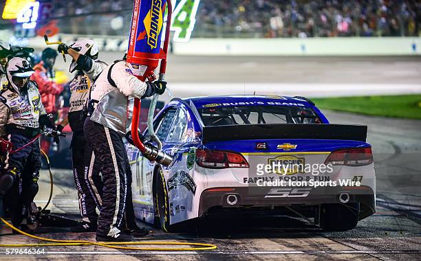 Apr 11, 2015- Ft. Worth, TX-- AJ Allmendinger , driving the Bush's Beans Chevrolet for Tad Geschickter takes on fuel at the Duck Commander 500 at the...